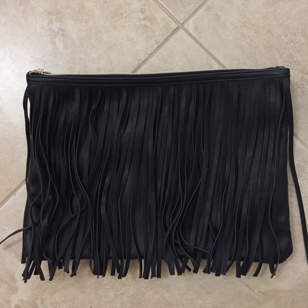 Large black fringe clutch